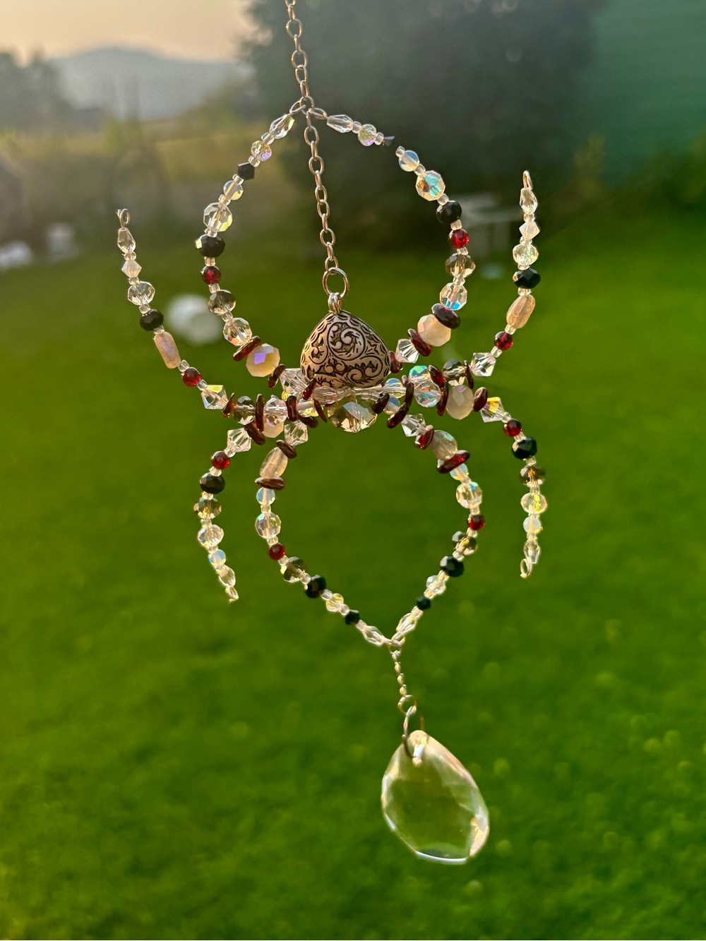 Gemstone and crystal spider Suncatcher.